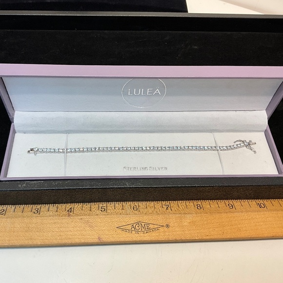 Lulea Sterling Silver and CZ Tennis Bracelet - Picture 1 of 9